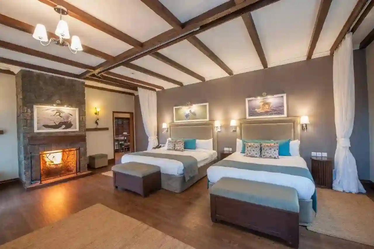 Twin room with fire lit, the retreat at ngorongoro