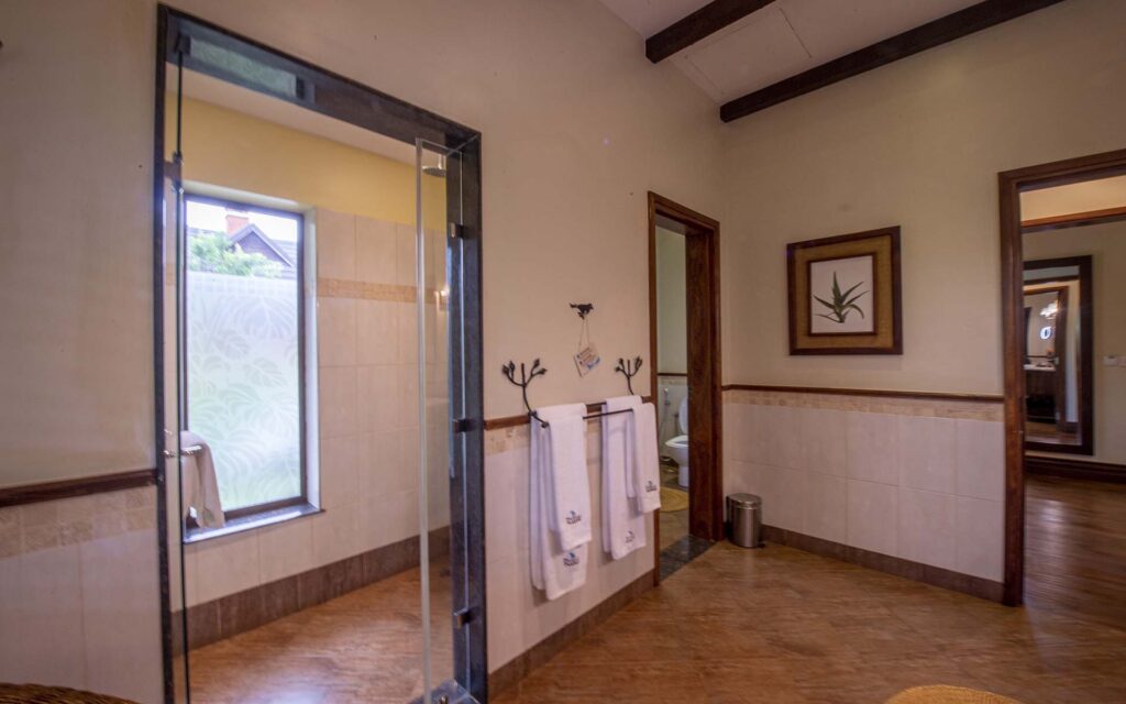 Bathroom with WC and rain shower in a Twin or Double Villa